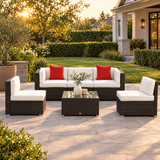 Wicker sectional sofa set on a backyard patio at golden hour