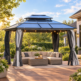 Hardtop gazebo on a backyard deck with lounge furniture