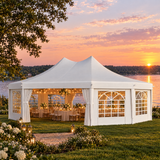 White event tent at a lakeside wedding reception