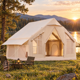 Inflatable glamping tent pitched by a lake at golden hour