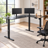 L-shaped standing desk raised in a modern home office